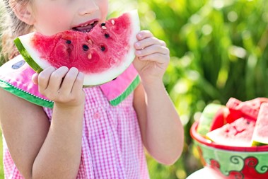 Child eating fruit